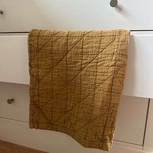 Camomile London baby crib quilt